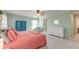 Comfortable bedroom featuring light green walls, a ceiling fan, and blue decorative furniture at 146 Stagecoach Ave, Summerville, SC 29486