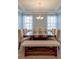 Bright dining room featuring a wooden table, upholstered chairs, and a stylish chandelier at 146 Stagecoach Ave, Summerville, SC 29486