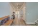 Bright and airy entryway boasting light wood floors, neutral walls, and recessed lighting at 146 Stagecoach Ave, Summerville, SC 29486