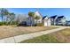 Traditional home with a manicured lawn, two-car garage, and attractive landscaping at 146 Stagecoach Ave, Summerville, SC 29486