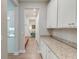 Hallway features built-in cabinets and a granite countertop at 146 Stagecoach Ave, Summerville, SC 29486