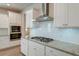 This modern kitchen has granite countertops and subway tile backsplash at 146 Stagecoach Ave, Summerville, SC 29486