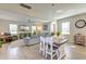 Combined living and dining space with contemporary decor and lots of natural light at 146 Stagecoach Ave, Summerville, SC 29486