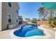 Beautiful swimming pool in the backyard with a basketball hoop and lounge chairs at 146 Stagecoach Ave, Summerville, SC 29486