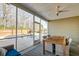 Enjoy the outdoors on the screened porch with views of the backyard pool at 146 Stagecoach Ave, Summerville, SC 29486
