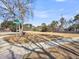 A street corner with signage and a view of a lot at 1501 Mcintosh Road, Johns Island, SC 29455