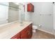 This bathroom is equipped with a sink, granite countertop, framed mirror, and a shower-tub combination at 1755 Central Park Rd # 5107, Charleston, SC 29412