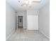 This bedroom features neutral walls, plush carpet, a ceiling fan, and a closet for ample storage space at 1755 Central Park Rd # 5107, Charleston, SC 29412