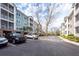 Apartment building exterior featuring multiple balconies and visible parking spots at 1755 Central Park Rd # 5107, Charleston, SC 29412