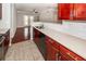 Well-lit kitchen with a view into the living area and stainless steel dishwasher at 1755 Central Park Rd # 5107, Charleston, SC 29412