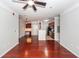 Open concept living room with hardwood floors connecting to a modern kitchen, perfect for entertaining at 1755 Central Park Rd # 5107, Charleston, SC 29412