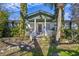 Charming home with an inviting porch, enhanced by greenery and a welcoming front entrance at 1812 Burgess St, Charleston, SC 29412