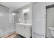 Modern bathroom with a glass-enclosed shower and an updated vanity with storage at 2017 Long Bend Dr, Seabrook Island, SC 29455