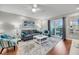 Comfortable living room with hardwood floors, area rug, and neutral decor at 2017 Long Bend Dr, Seabrook Island, SC 29455