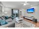 Cozy living room features stylish furniture, decor, and a mounted television at 2017 Long Bend Dr, Seabrook Island, SC 29455