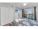 Bright bedroom with a private balcony and a flat screen TV for relaxing evenings at 2017 Long Bend Dr, Seabrook Island, SC 29455