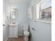 Bathroom with a vanity with a sink, medicine cabinet and window letting in natural light at 204 Tram Blvd, Summerville, SC 29486