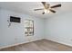 Bright bedroom with a ceiling fan, hardwood floors, and window providing natural light at 204 Tram Blvd, Summerville, SC 29486