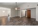 Open living room with modern lighting and hardwood floors at 204 Tram Blvd, Summerville, SC 29486