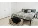 Bright bedroom with a modern bed frame and black-and-white geometric patterned bedding at 2045 Country Manor Dr, Mount Pleasant, SC 29466