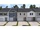 Charming townhomes showcasing unique architectural details and inviting curb appeal at 2104 Scarlett Maple St, Summerville, SC 29486