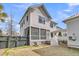 Screened-in porch and well-maintained backyard for enjoying the outdoors in comfort and style at 213 Amberjack Ln, Charleston, SC 29492