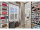 Luxury walk-in closet featuring shoe racks, luggage storage, and custom shelving at 213 Amberjack Ln, Charleston, SC 29492