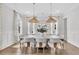 Elegant dining room with stylish lighting, table, and inviting decor at 213 Amberjack Ln, Charleston, SC 29492