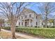 Elegant two-story home showcasing classic architecture and neat, green landscaping at 213 Amberjack Ln, Charleston, SC 29492