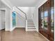 Bright entryway boasts beautiful flooring, staircase and a grand front door at 213 Amberjack Ln, Charleston, SC 29492