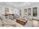 Open-concept living area with modern furnishings and an airy feel at 213 Amberjack Ln, Charleston, SC 29492