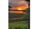 Scenic sunset view from the backyard overlooking the marsh at 2156 Cheswick Ln, Mount Pleasant, SC 29466