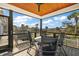 Enjoy stunning water views from the covered deck, complete with comfortable seating and a ceiling fan for added comfort at 2156 Cheswick Ln, Mount Pleasant, SC 29466