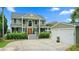 Beautifully landscaped home with a two-car garage and a well-maintained lawn at 2156 Cheswick Ln, Mount Pleasant, SC 29466