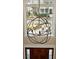 Grand foyer showcasing a modern chandelier and a view of the front door and neighborhood at 2156 Cheswick Ln, Mount Pleasant, SC 29466