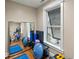 Home gym equipped with a mirror, weights, yoga mats, and various exercise equipment at 2156 Cheswick Ln, Mount Pleasant, SC 29466