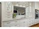 Kitchen with stainless steel refrigerator, white cabinets, and marble countertops at 2156 Cheswick Ln, Mount Pleasant, SC 29466