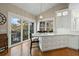 Well-lit kitchen features white cabinetry, marble countertops, and stainless steel appliances at 2156 Cheswick Ln, Mount Pleasant, SC 29466