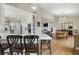 Open-concept kitchen with marble island, modern appliances, and adjoining dining area at 2156 Cheswick Ln, Mount Pleasant, SC 29466