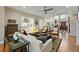Open-concept living room with a view of the kitchen and a staircase to the second floor at 2156 Cheswick Ln, Mount Pleasant, SC 29466