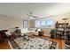 Spacious living room featuring ample natural light, a comfortable sofa, and a decorative rug at 2156 Cheswick Ln, Mount Pleasant, SC 29466