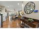 Elegant living room featuring hardwood floors, fireplace, and backyard view at 2156 Cheswick Ln, Mount Pleasant, SC 29466