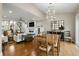 Open concept living and dining space with hardwood floors and lots of natural light at 2156 Cheswick Ln, Mount Pleasant, SC 29466