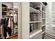 Spacious walk-in closet with custom shelving and organized storage for clothes and accessories at 2156 Cheswick Ln, Mount Pleasant, SC 29466