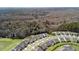 Aerial view of the community layout with trees around the neighborhood at 222 River Martin Ct, Summerville, SC 29483