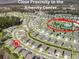 An aerial view highlighting the close proximity to the amenity center, pool and tennis courts in the community at 222 River Martin Ct, Summerville, SC 29483