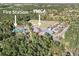 Aerial view showcasing the YMCA and Fire Station nestled within a nature-filled community at 222 River Martin Ct, Summerville, SC 29483