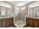 Beautiful bathroom featuring double sink vanity, granite countertop, tile flooring and a glass enclosed shower at 222 River Martin Ct, Summerville, SC 29483
