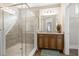 Bathroom with a glass-enclosed shower, granite countertops, and sleek fixtures, plus wood look flooring at 222 River Martin Ct, Summerville, SC 29483