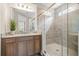 Bathroom featuring a granite countertop, tile flooring, and a glass enclosed shower with neutral color palette at 222 River Martin Ct, Summerville, SC 29483